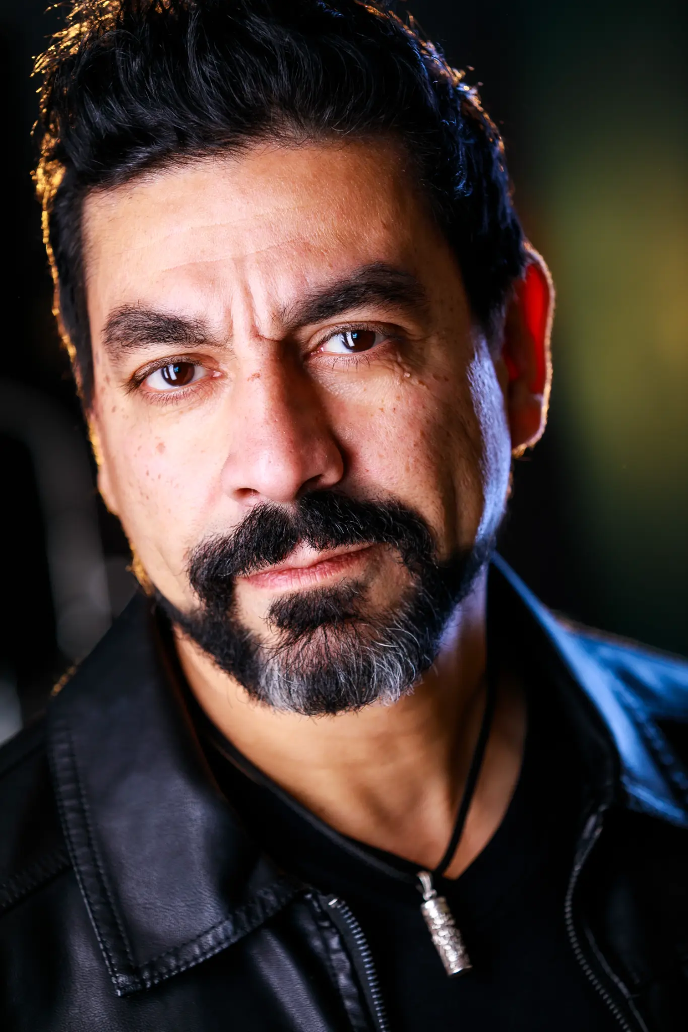 Ayman Samman Headshot - Leather Jacket