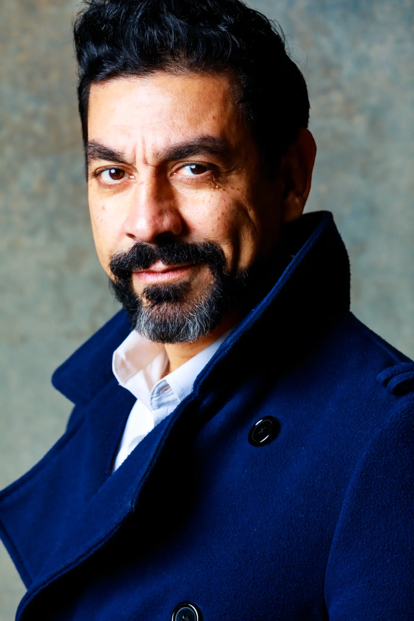 Ayman Samman Headshot - Navy Coat